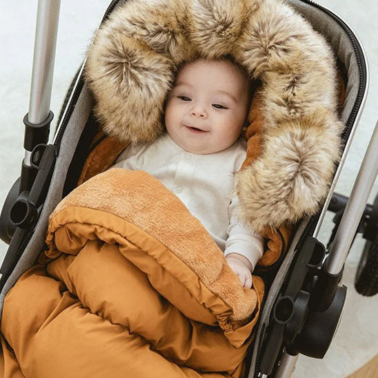 Chancelière de poussette pour bébé : Le confort en toute saison avec le bon accessoire !
