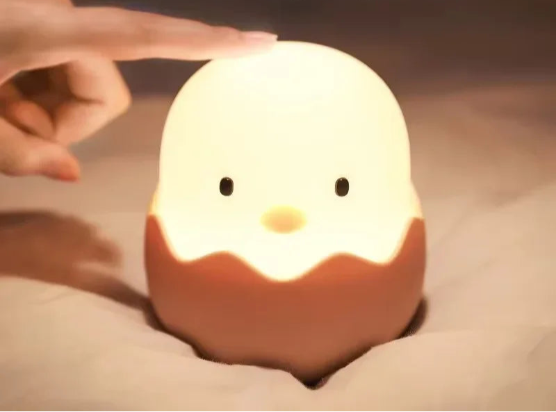 Veilleuse-bebe-coquille-tactile