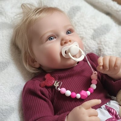 attache tetine marron