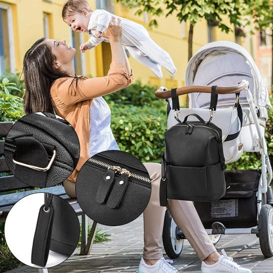 mere,enfant et sac a langer noir sur poussette