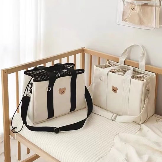 Sac a langer portatif noir et blanc